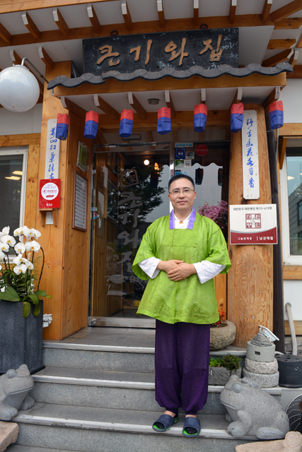 chef outside restaurant